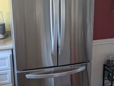 LG Standard-Depth 25.1-cu ft 33-in Wide with Ice Maker - 32.8" wide 35.4" deep 69.8" tall