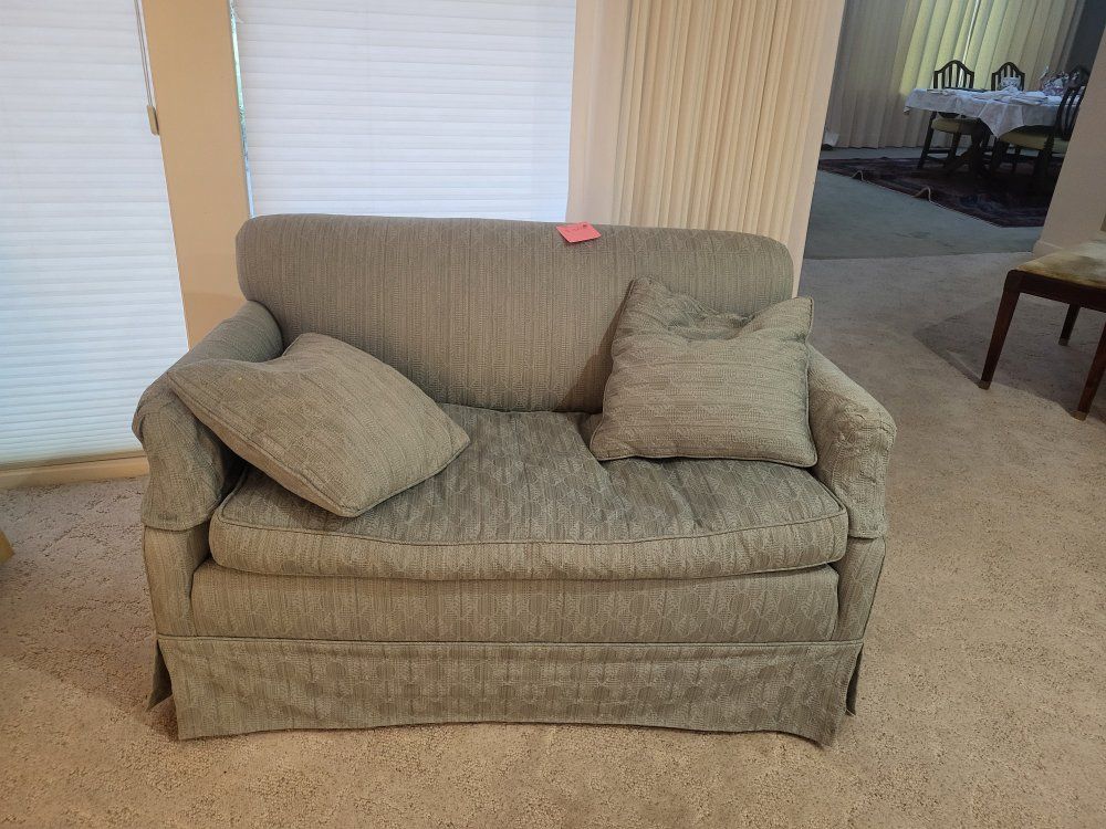 blue green upholstery love seat