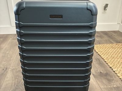 24 inch suitcase, never used - have 2