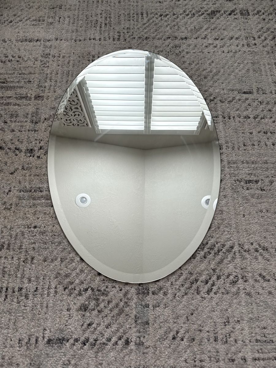 Oval beveled mirror