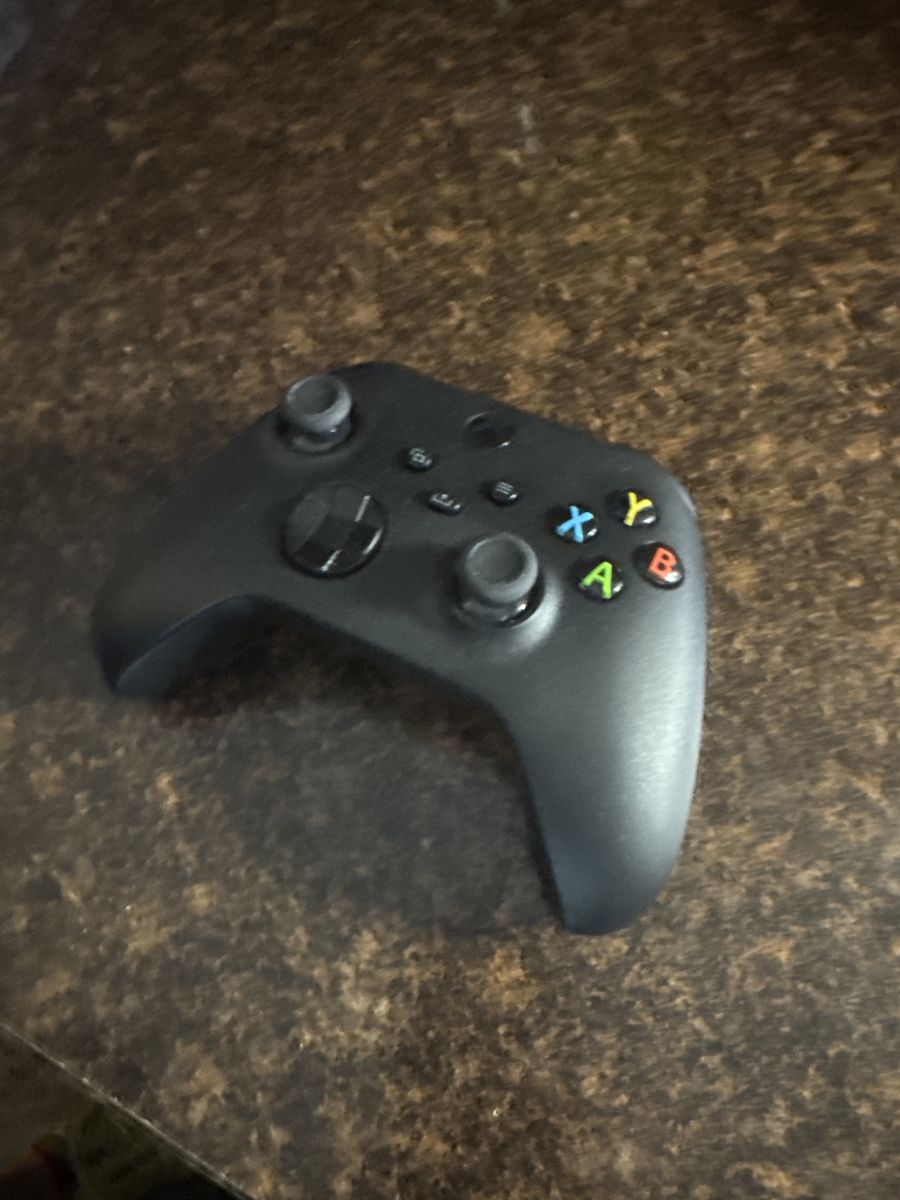 Xbox Core controller. With rechargeable battery.