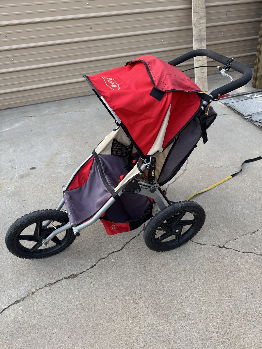 BOB Revolution Jogging Stroller - Red/Gray - Fixed Front Wheel, Tire Sealant