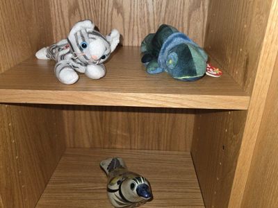 Assorted Home Decor Items: Vases, Candle Holders, and Faux Plants