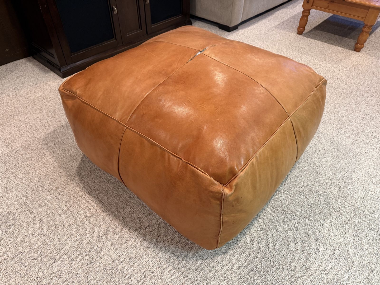 Tan leather ottoman