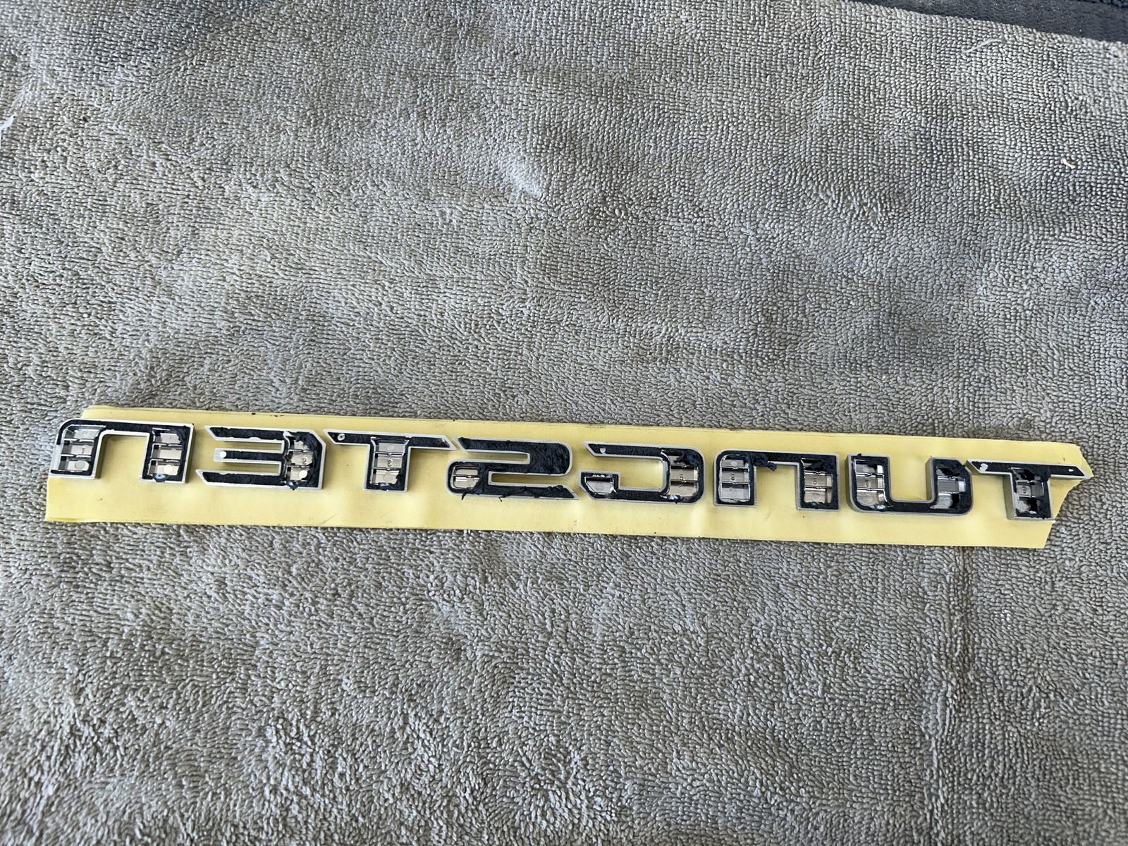 19-26 Ram 1500 Tailgate Nameplate (TUNGSTEN)