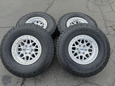 New Silver KMC KM549 6x135 Falken AT4w 35x11.50r17