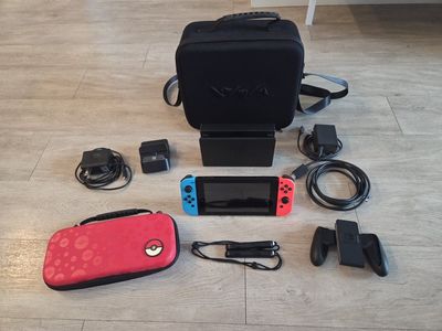 Nintendo Switch Console with Joy-Con Controllers, Docks, Accessories & Carrying Cases