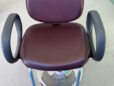 Barber Hydraulic chair and professional hooded hair dryer.