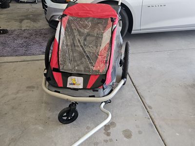 Kidarooz portable children's cart two seater with storage and screens