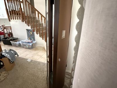 Tall corner cabinet (fits into a room corner)
