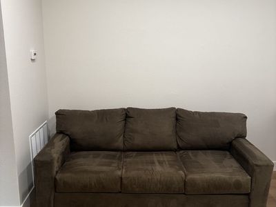 Green suede pull out sofa