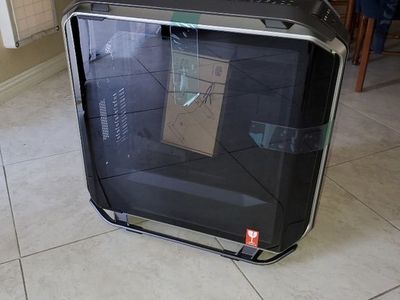Cooler Master Cosmos C700M E-ATX Full-Tower with fans and RGB sync.