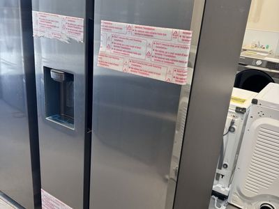 New scratch and dent Samsung 27.4 cu. ft. Standard Depth Side-by-Side Refrigerator in Stainless Steel