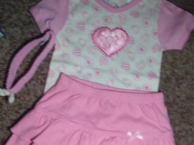 PRETTY IN PINK 3 PIECE OUTFIT...6-9 MOS......RUFFLY SKIRT, SHIRT WITH SILK HEART APPLIQUE, HEADBAND