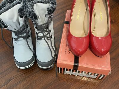 Snow boots and red heels