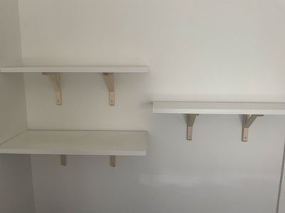 Set of White Wall Shelves with Light Wood Support Brackets