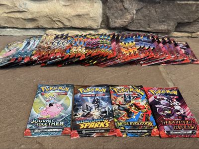 Various Pokémon Card TCG packs (see pictures) Pokemon destined rivals surging sparks mega evolutions and journey together
