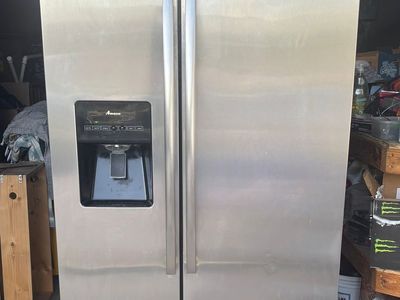 Amana Stainless Steel Dual Door Refrigerator Freezer Ice Maker Front Water and Ice Dispenser