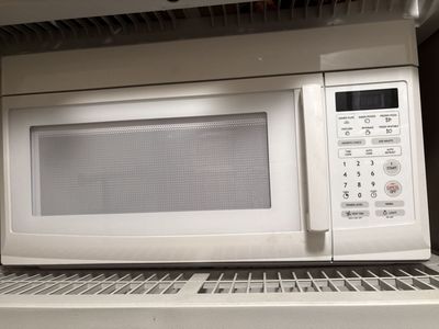 White Over-the-Range Microwave Oven with Vent Fan & Light