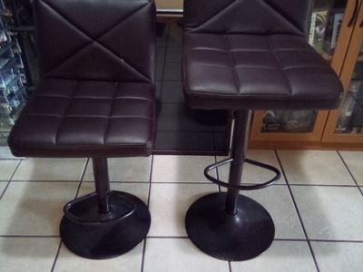 Pair of Brown Faux Leather Swivel Adjustable Bar Stools with Footrests