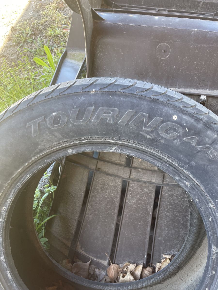 Touring A/S 215/65R16