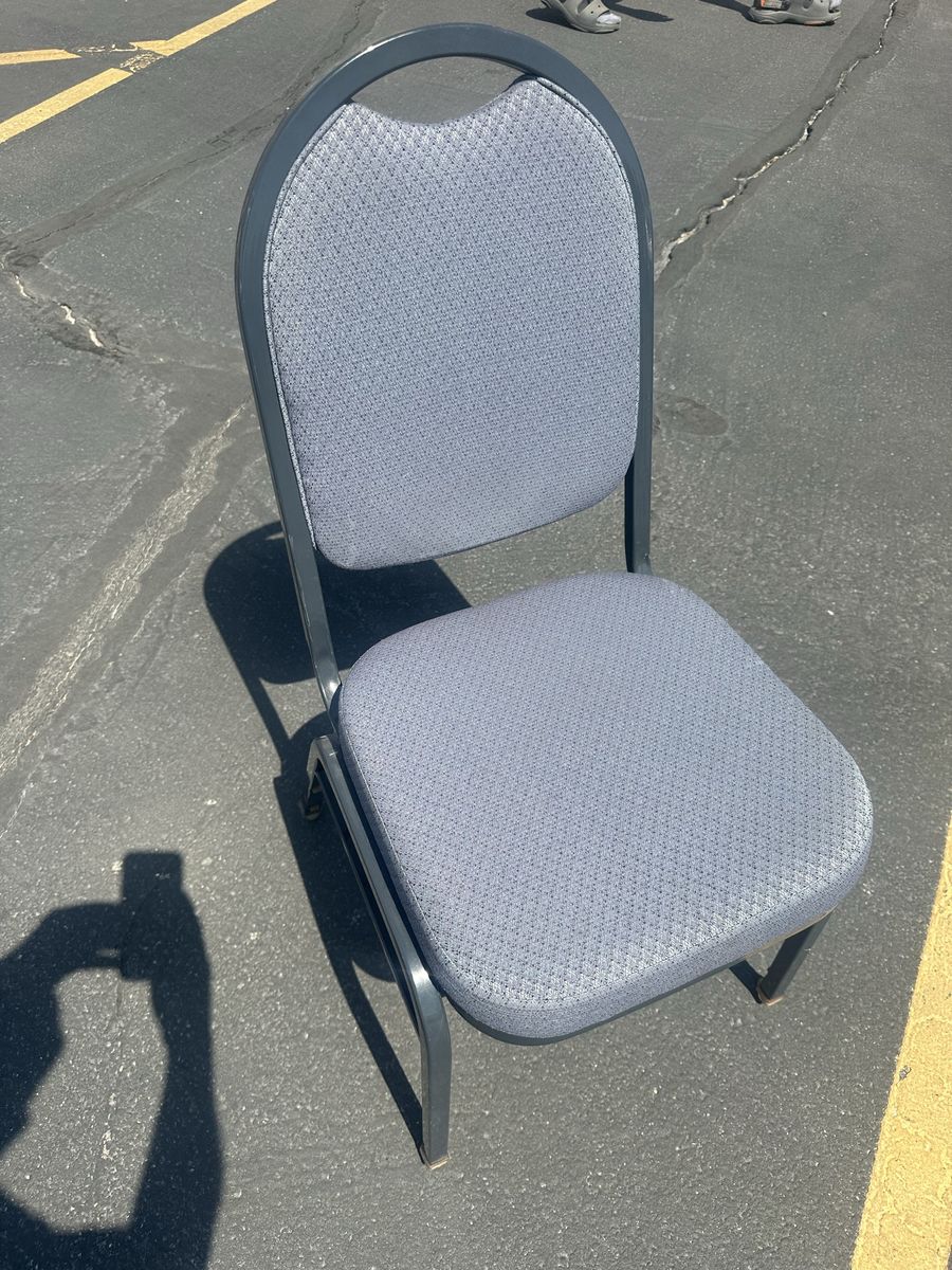 Gray Stackable Cushioned Chair - Good Condition, Versatile Seating Solution