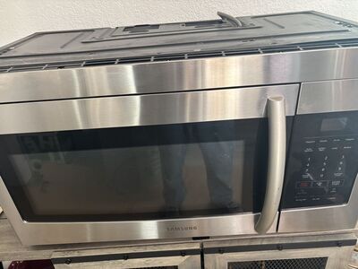 @+ Microwave Samsung Stainless Steel Above Stove in Great Working Condition