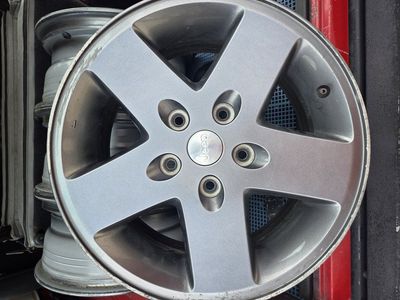 4 Stock jeep rims 17" 5x127 (5x5)