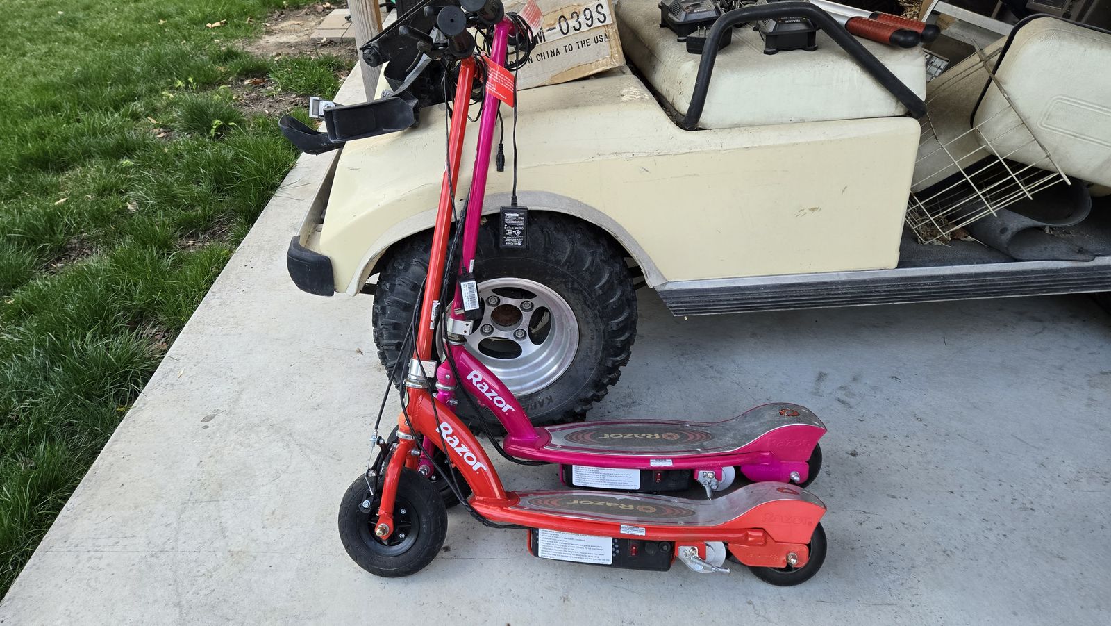Pair of Razor E100 Glow Electric Scooters - Red & Pink, Rechargeable