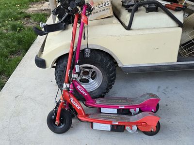 Pair of Razor E100 Glow Electric Scooters - Red & Pink, Rechargeable