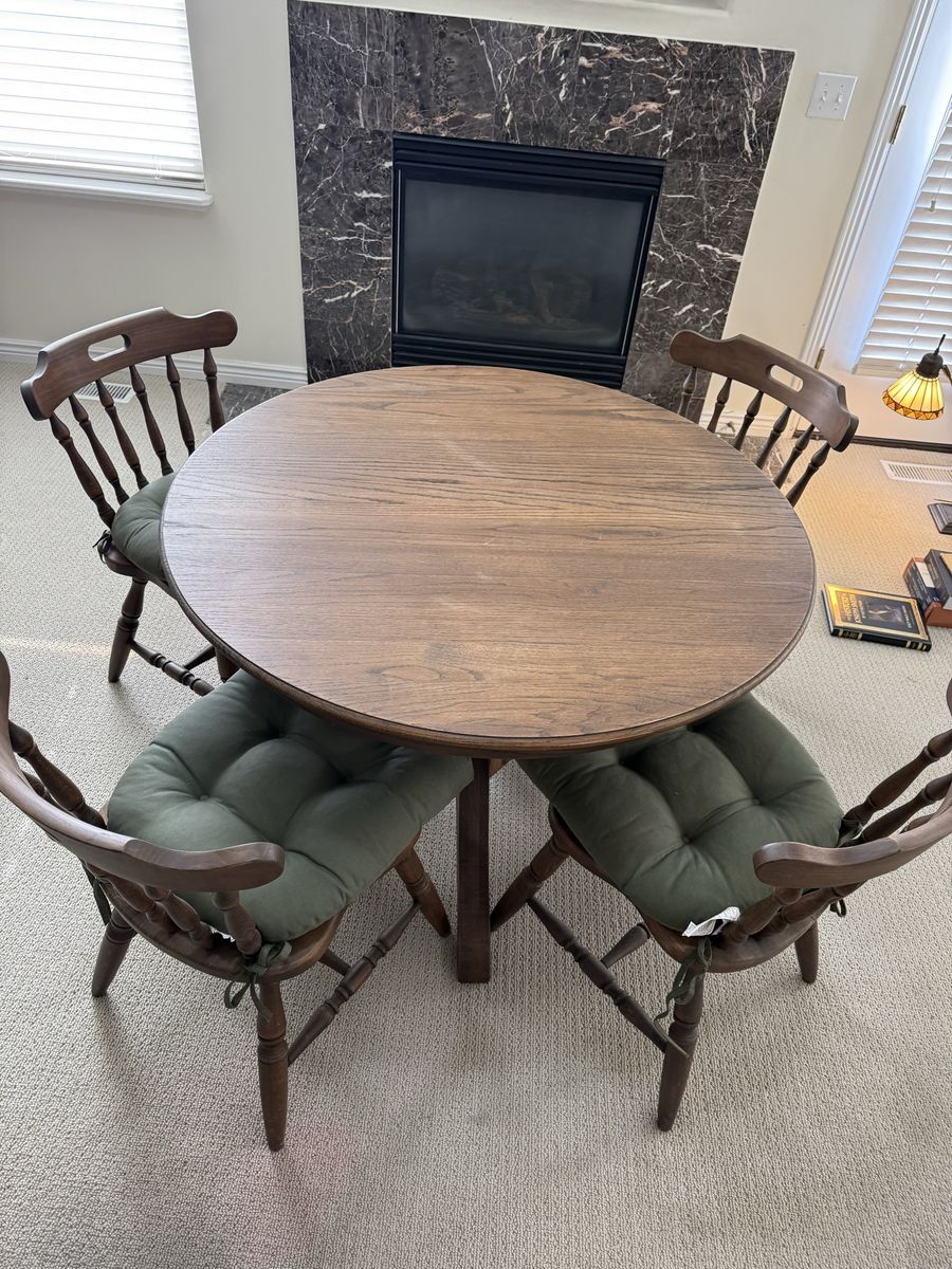 Round Wooden Dining Table with Four Windsor Style Chairs and Cushions