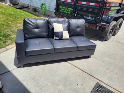 Black Vinyl Sofa Piece w/Pillows
Qty-1