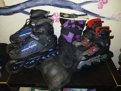 2 pairs of Roller Blades and pads