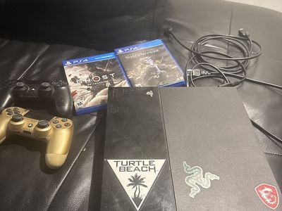PlayStation 4 with controllers
