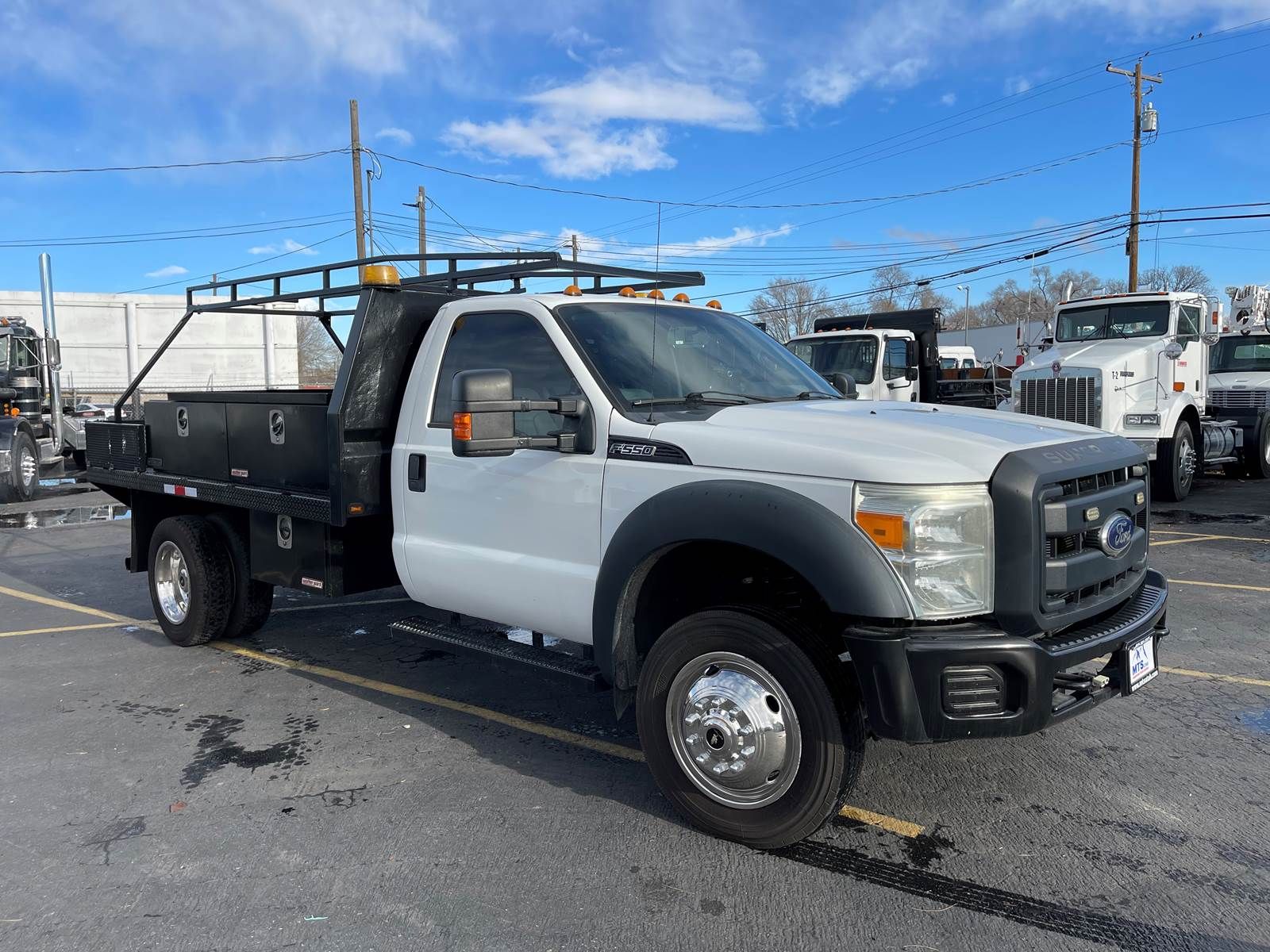 2016 FORD F550 SD XL, 4WD Flatbed Truck, Ladder Rack, V-10 6.8L, 6 Spd Auto, 385 H.P.