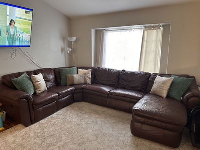 COMFY LEATHER SECTIONAL SLEEPER!