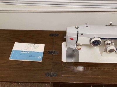 White Model 660 Zigzag Sewing Machine with Original Manual & Cabinet