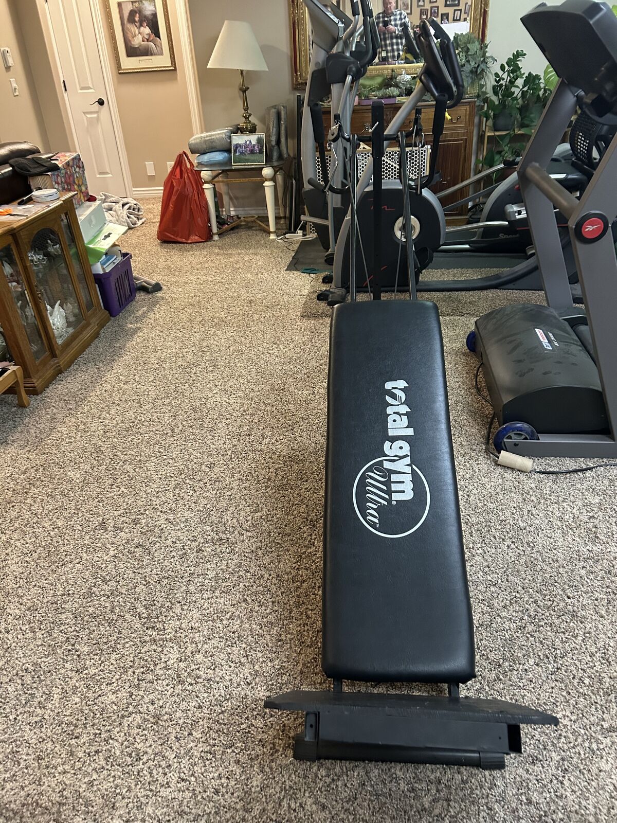 Total Gym, has very little use and is in good condition.