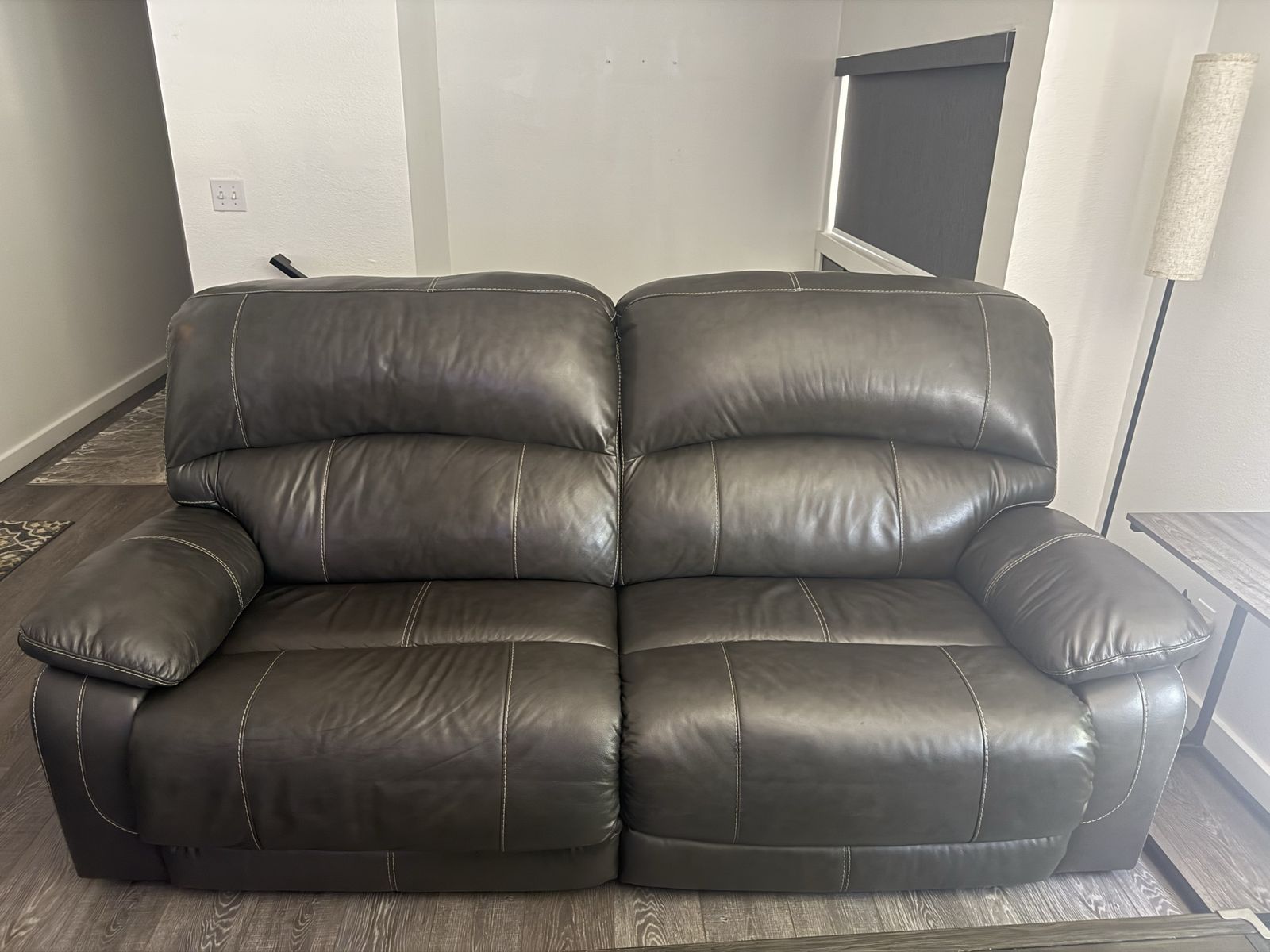 2 couches- 1 Reclining couch AND 1 reclining loveseat with console (leather and power)