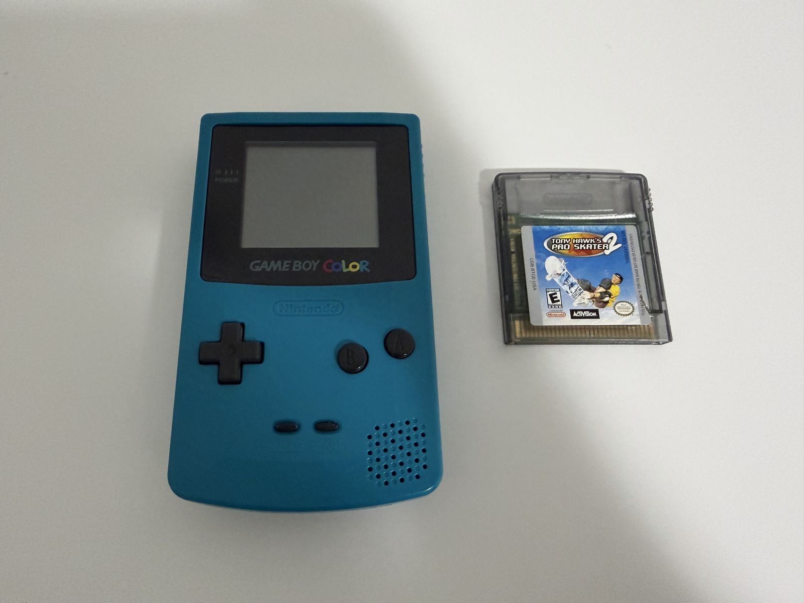 Nintendo Gameboy Color Teal Handheld Console with Tony Hawk Pro Skater 2