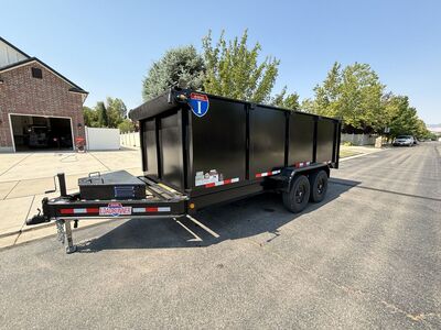 Rent a 16x7 dump trailer.