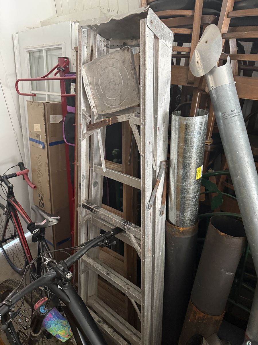 2 six foot ladders 1 wood 1 aluminum