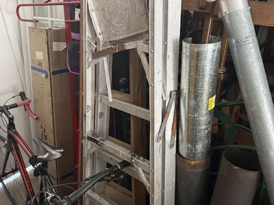 2 six foot ladders 1 wood 1 aluminum
