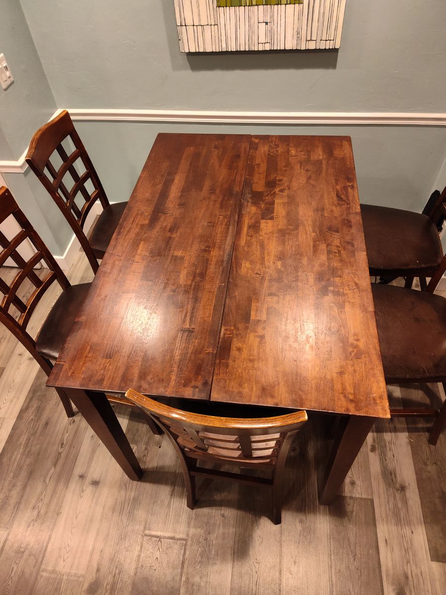 expandable kitchen table and 6 chairs