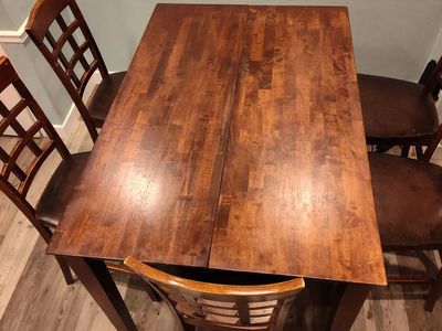 expandable kitchen table and 6 chairs