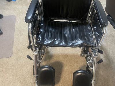 Standard Manual Wheelchair - Black Vinyl, Chrome Frame - Lightweight & Foldable for Transport. 20 inch seat.