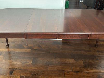 Solid wood table with cherry finish