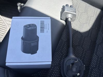 Tesla NEMA 14-30 charging adapter and J1772 adapter