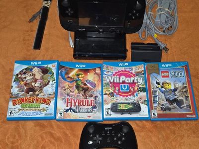 Nintendo Wii U Deluxe with 6 games including Wii Party U! trades considered!