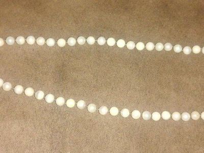 18k gold Aroya Pearl necklace from Hawaii with a 20" length.